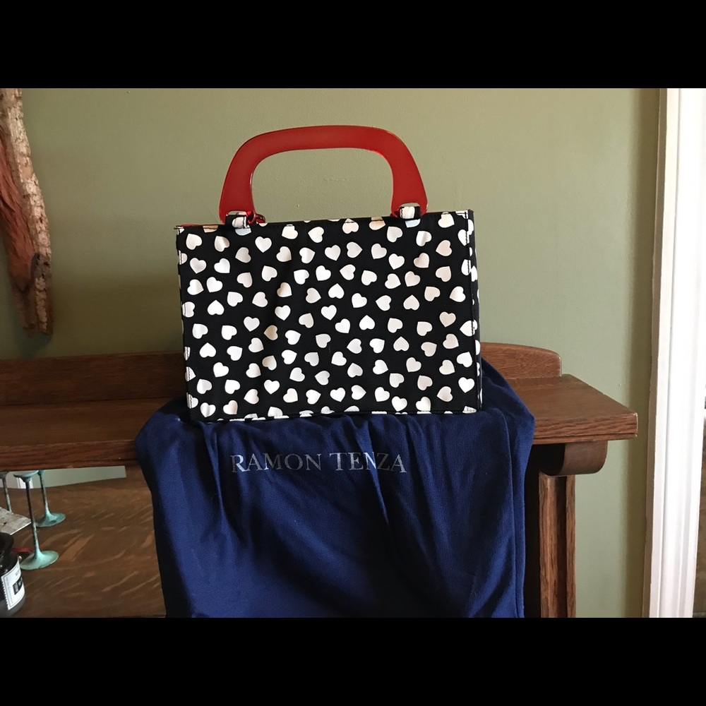 Ramon Tenza Black, White and Red Handbag. 12”Lx 8 1/4”H x 3 5/8”D. Made in Spain